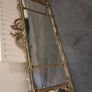 Two distinct antique giltwood mirrors with elaborate French-style ornamentation Image 3