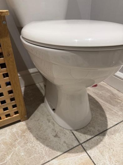 Bathroom sink, toilet, radiator