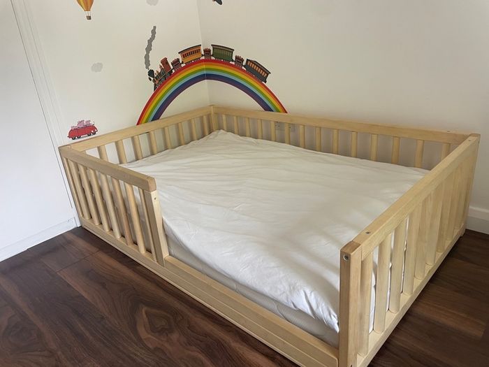 Gorgeous wooden toddler bed and brand new unused high quality mattress