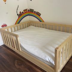 Gorgeous wooden toddler bed and brand new unused high quality mattress