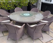 Rattan garden dining set with glass top table and 8 chairs