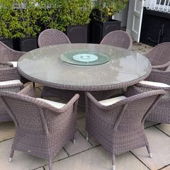 Rattan garden dining set with glass top table and 8 chairs