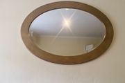 oval gold mirror