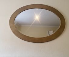 oval gold mirror
