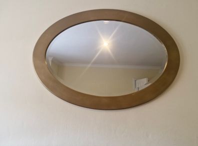 oval gold mirror