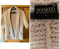 Soaked in luxury gold Copenhagen designer knit cardigan chic neutral timeless elegant