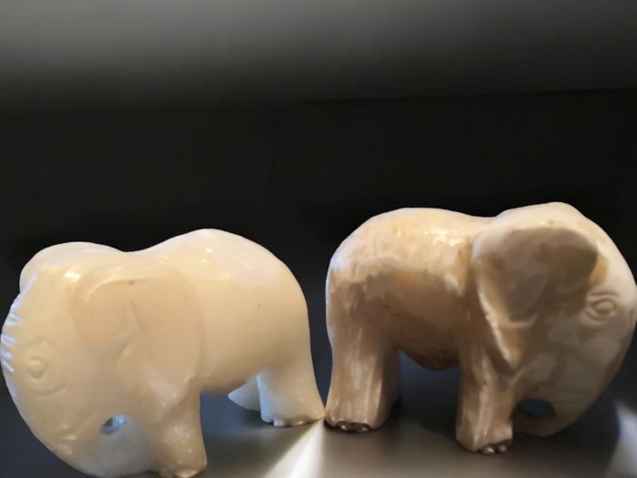 Pair of heavy white marble elephant bookends