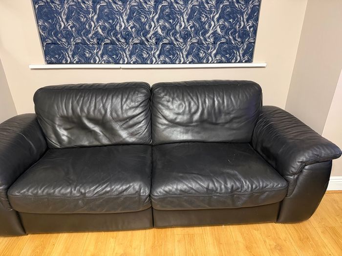 Black leather Natuzzi sofa and two chairs