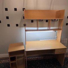 Desk with bookshelf and light