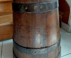 Antique French butter churn upcycled to umbrella or walking stick holder