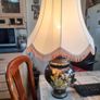 Beautiful Old Large Creamic Table Lamp  Hand Painted Floral Motifs Decorative Chinoiserie Inspired, and a Cream Colored Fabric Shade with Fringed Edging. Image 2