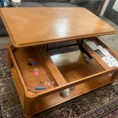 Top lift oak table with storage and wheels