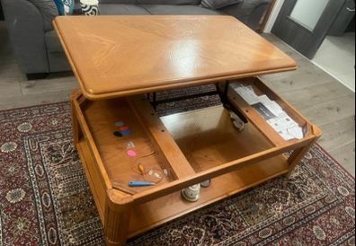 Top lift oak table with storage and wheels