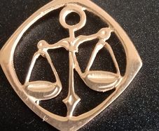 Solid 9 carat gold star sign Libra pendant