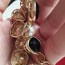 A beautiful gold-tone bracelet. Image 3