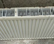 A large 2 column horizontal radiator 160cmx60cm high includes fitting bracket and valves.