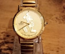 Lorus by Seiko Y481-1720 RO Gold Coin Watch.