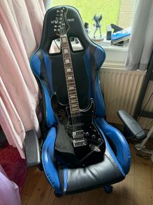 Guitar with speaker