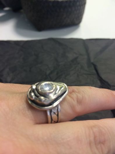 Silver ring with white  stone