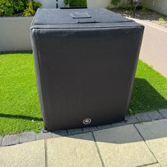 Yamaha DXS18XLF subwoofer with cover and castors