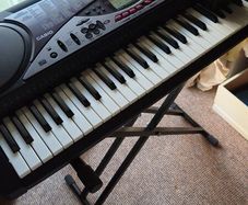 Casio keyboard LK 50 with a stand
