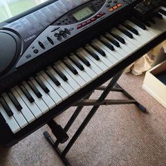Casio keyboard LK 50 with a stand