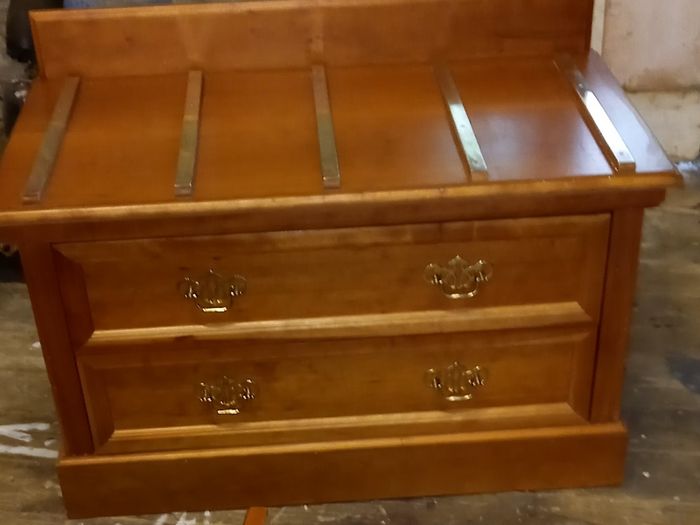 Chest with suitcase set down on top
