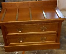 Chest with suitcase set down on top