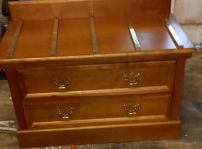 Chest with suitcase set down on top