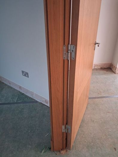 Oak Doors, solid oak frames, architrave and skirting.