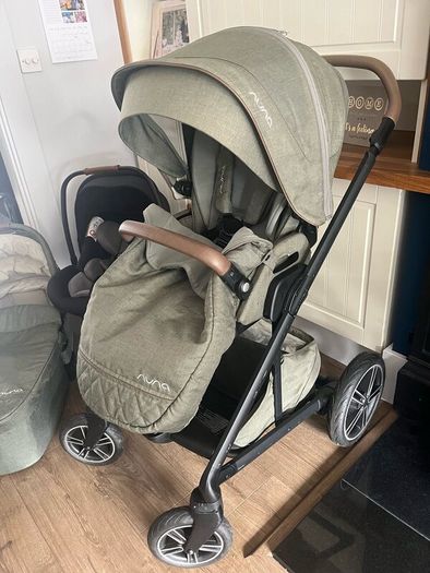 Nuna travel system including isofix base
