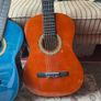 2 guitars with covers and one stand Image 2