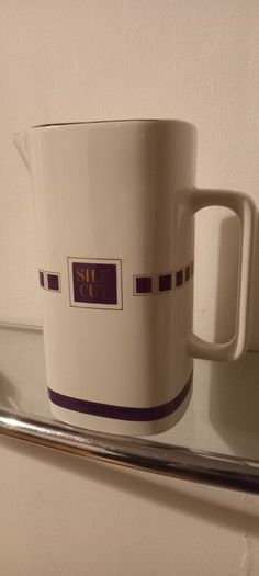 Silcut purple whiskey water jug