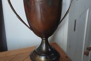 historical bronze golfing trophy