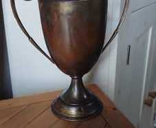 historical bronze golfing trophy