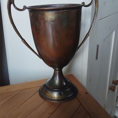 historical bronze golfing trophy