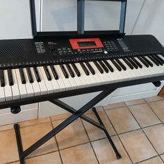 Electronic keyboard, stand & carry bag.