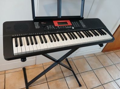 Electronic keyboard, stand & carry bag.