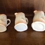 A set of 3 Large Peach Floral porcelain Graduating jugs Image 4