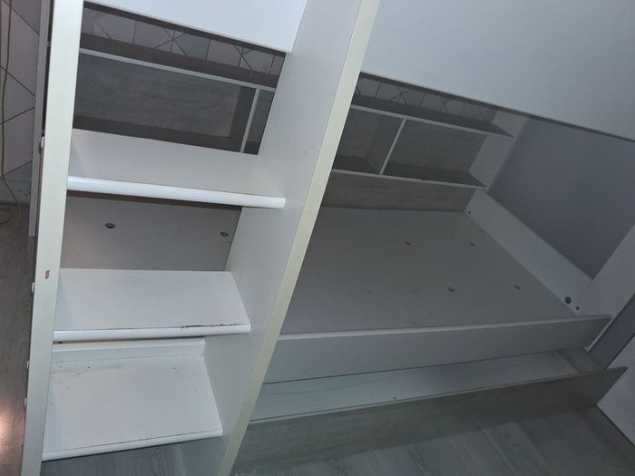 Bunk beds with integrated shelving