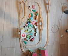 Wooden train set and wooden peg bench