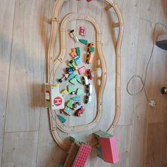 Wooden train set and wooden peg bench