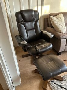 Brown Leather armchair and matching footstool