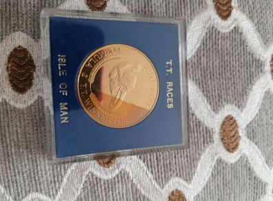 T T races 1911-1986 75th anniversary coin