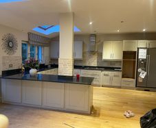 Entire kitchen Quartz work top solid wooden shaker style doors
