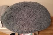 large round fluffy cushion