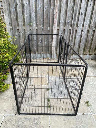 Black metal dog pen