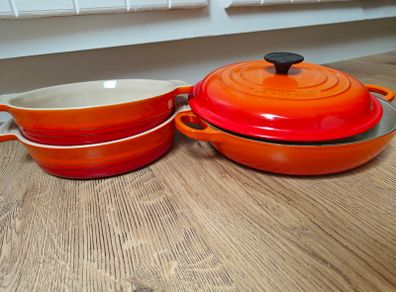 la creuset set - cast iron dish and 2 round dishes