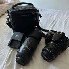 Nikon D5600 Camera with xtra telephoto lens.  Neg