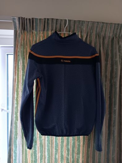 O'Neills Meath GAA Zip Top. Age 13. Width 47cm, Length 54cm. Very Good Condition. Price Includes Postage.